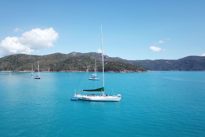 a small boat in a large body of water