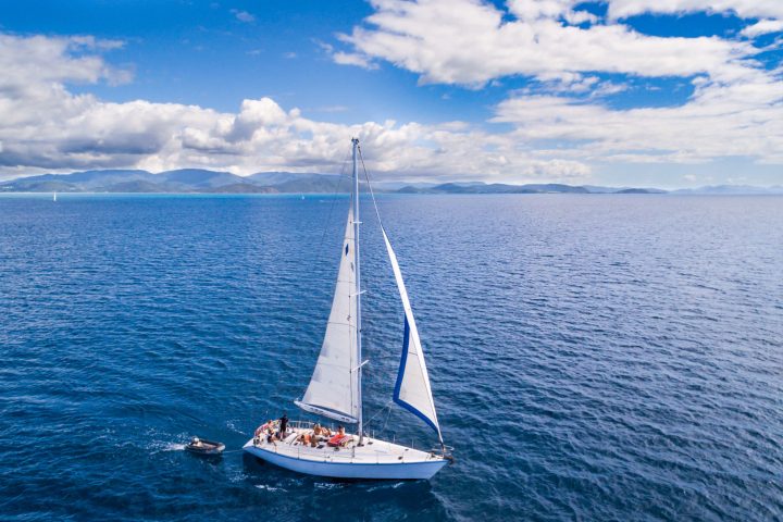a small boat in a large body of water
