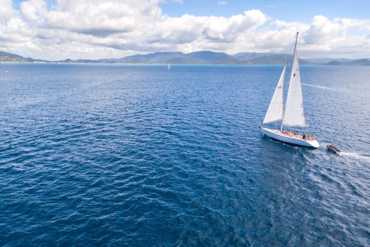 a small boat in a large body of water
