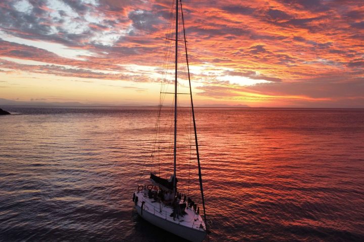 a sunset over a body of water