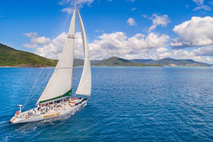 a small boat in a large body of water