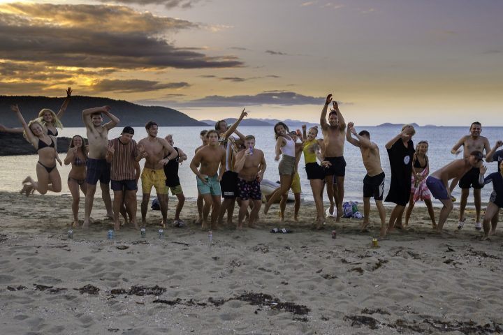 a group of people on a beach