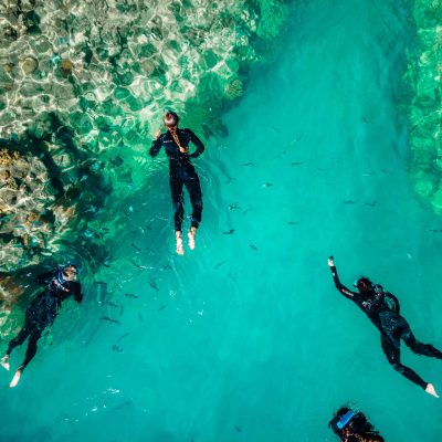 a person swimming in a pool of water