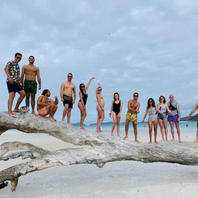 a group of people on a beach