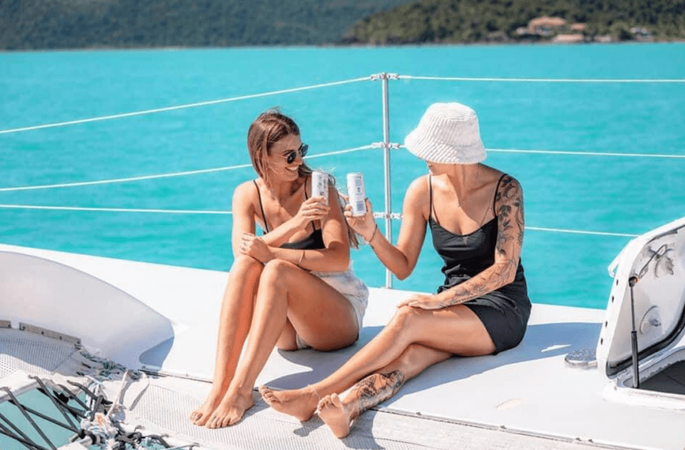 a couple of people that are sitting on a boat