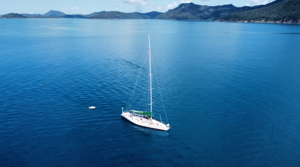 a small boat in a large body of water