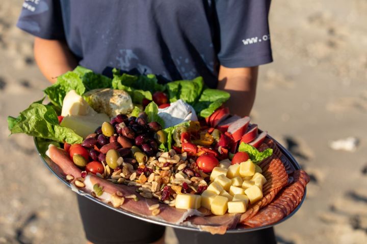 a bowl of fruit and vegetable salad
