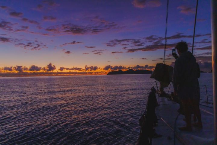 a sunset over a body of water