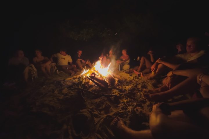 a group of people in a dark room